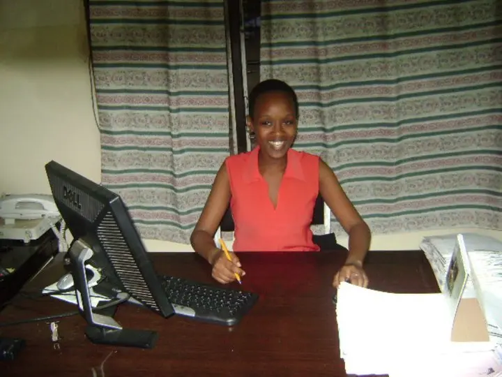 "Wambui working at a microfinance branch office in Kenya, learning the importance of customer service in microfinance."